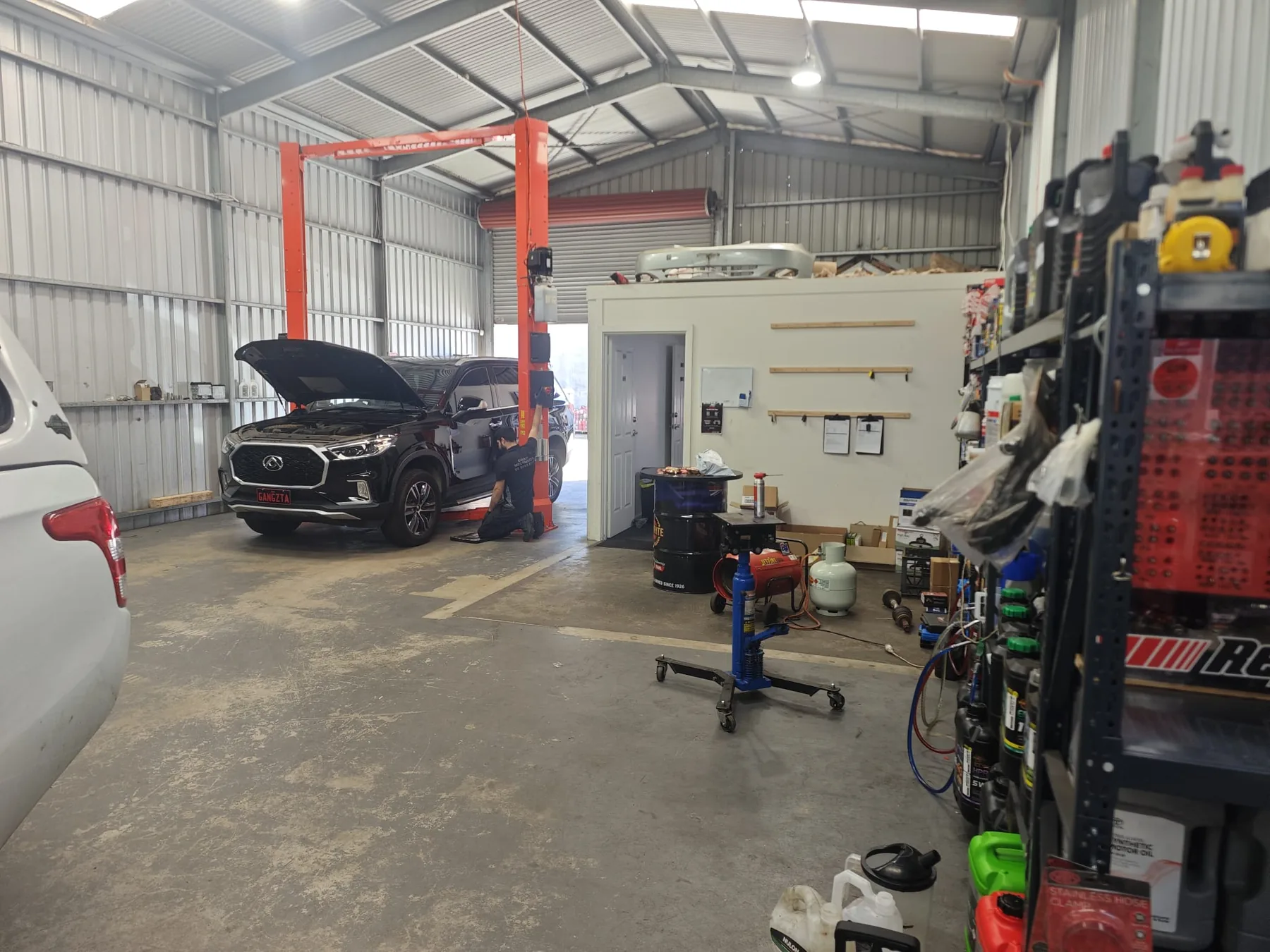 Vehicle up on the hoist